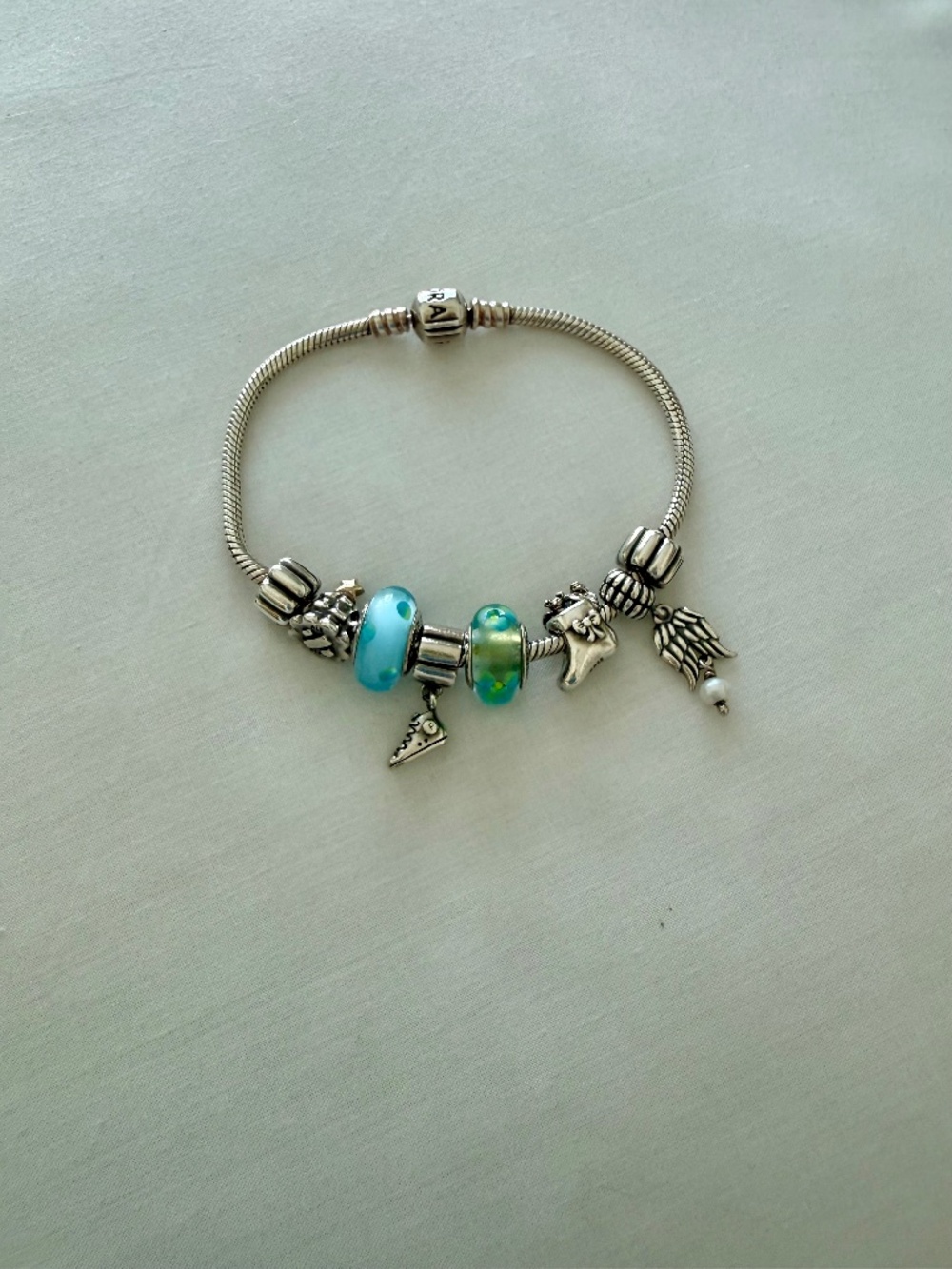 Pandora bracelet with charms including 2 holiday charms
